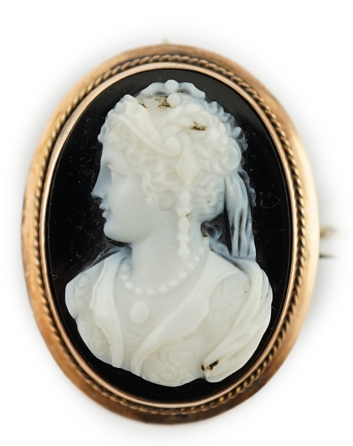 A Victorian 9ct gold mounted oval sardonyx cameo set brooch